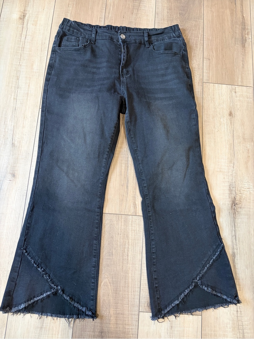 Women’s Black Flared Jeans with Frayed Hem